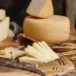 pieces of fresh homemade cheese on a wooden board 2026 01 09 00 04 16 utc | Dolce Parma