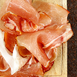cured ham slices on wooden board with rust 2026 03 19 10 42 54 utc 1 | Dolce Parma