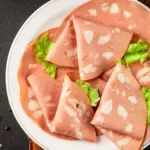 meat slices with greens on a plate 2026 03 16 06 12 15 utc | Dolce Parma