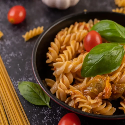 Dolce Parma : un site internet réalisé par Avaelys, agence web à Aix-en-Provence 2 | Dolce Parma pasta-with-tomato-sauce-and-basil-leaves-2026-03-17-01-37-02-utc